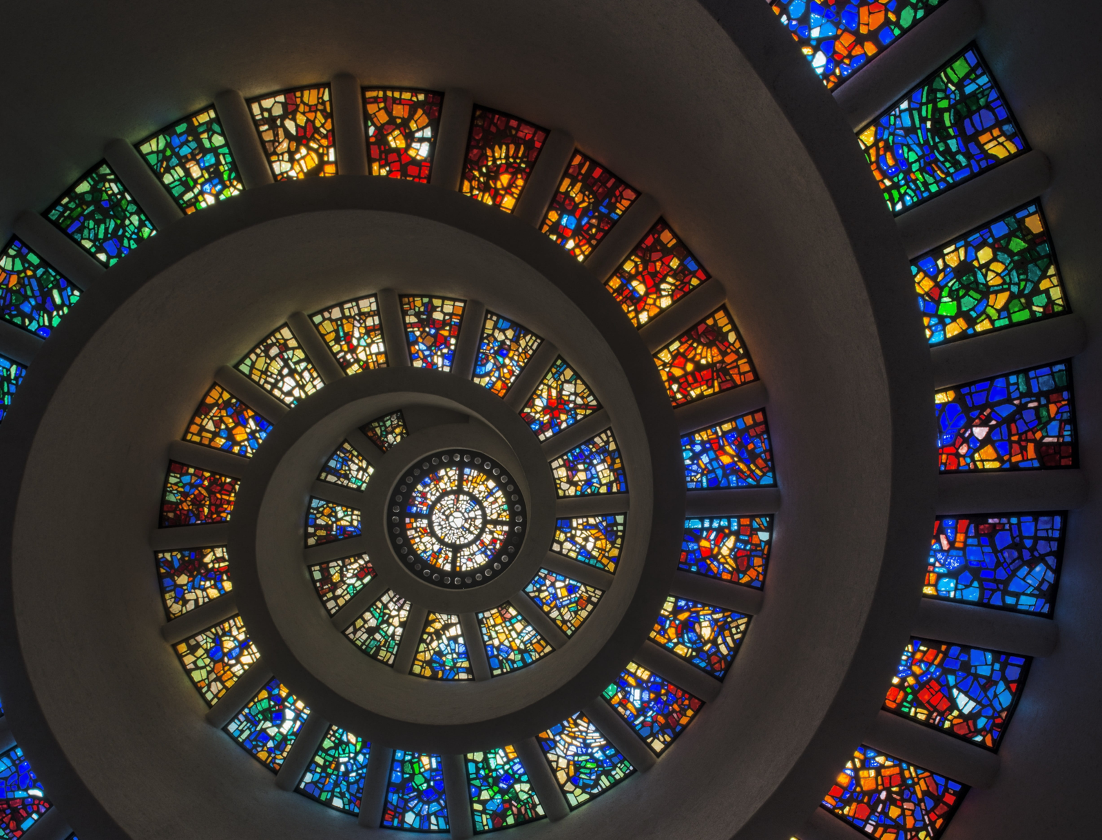 Custom art glass solutions with sandblasted, etched and digital printed glass combining craft and technology for high-end applications